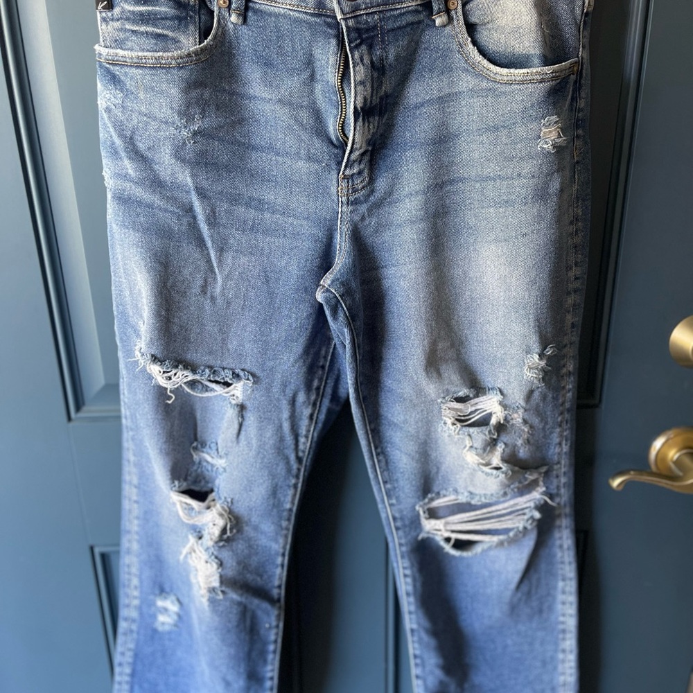 Distressed Blue Jeans